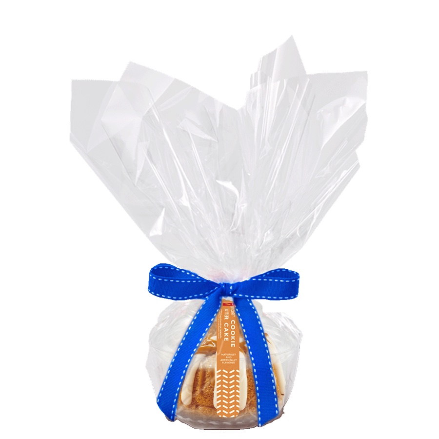 A wrapped Nothing Bundt Cakes bundtlet with a blue bow, as it arrives